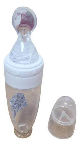 Mamadera de silicona para bebés de colores.